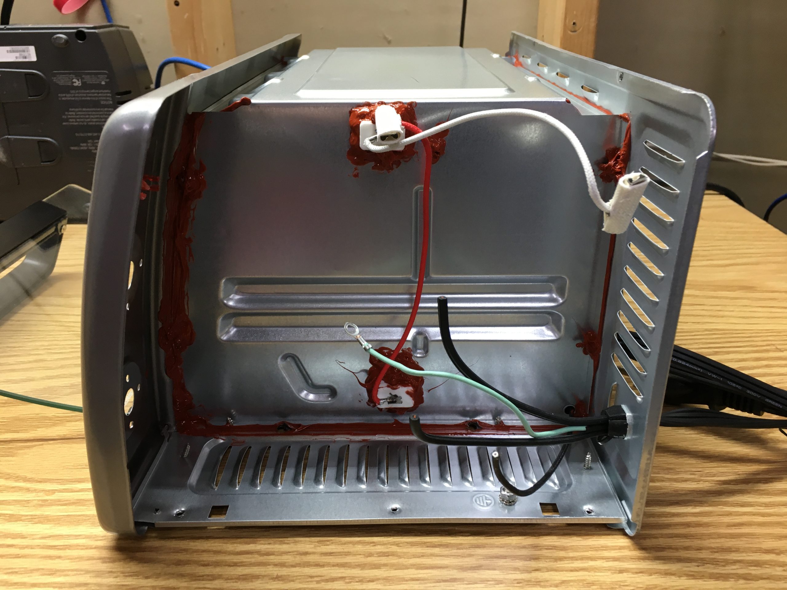 Control compartment with original electronics removed, sealed